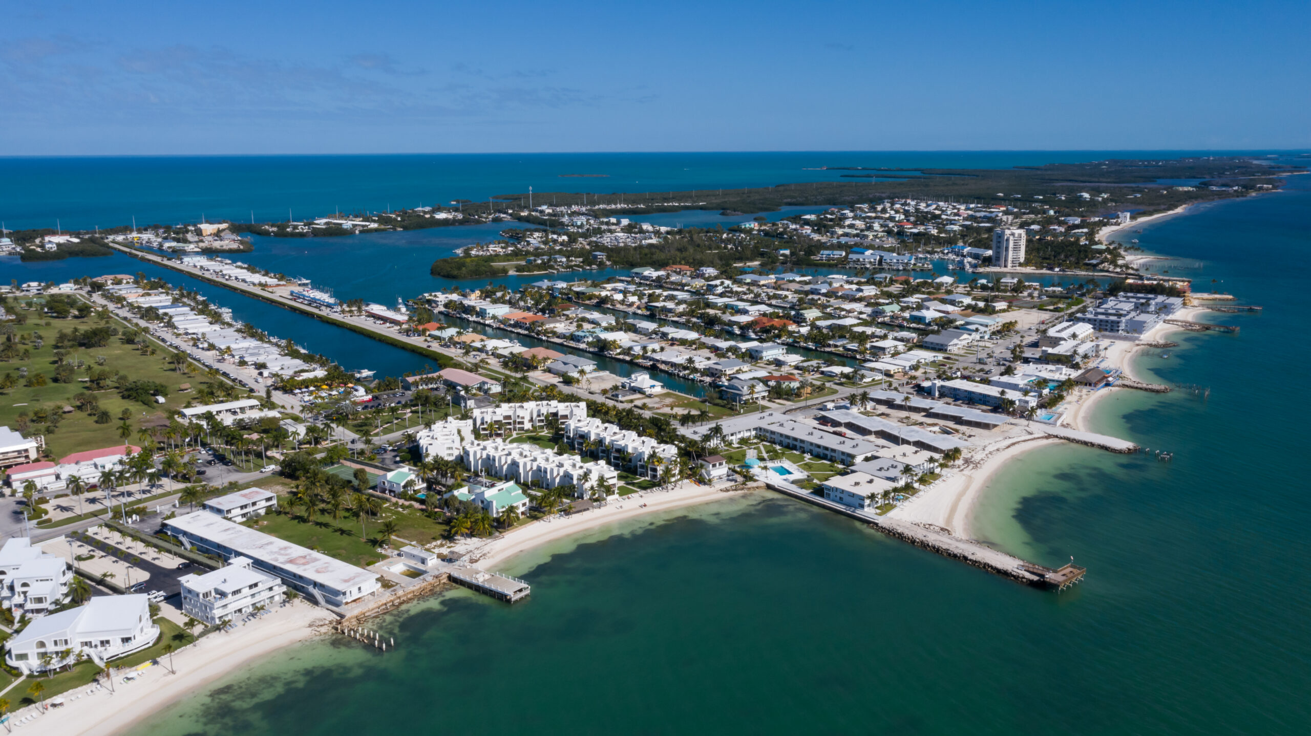 Aerial view of beachfront town and pier