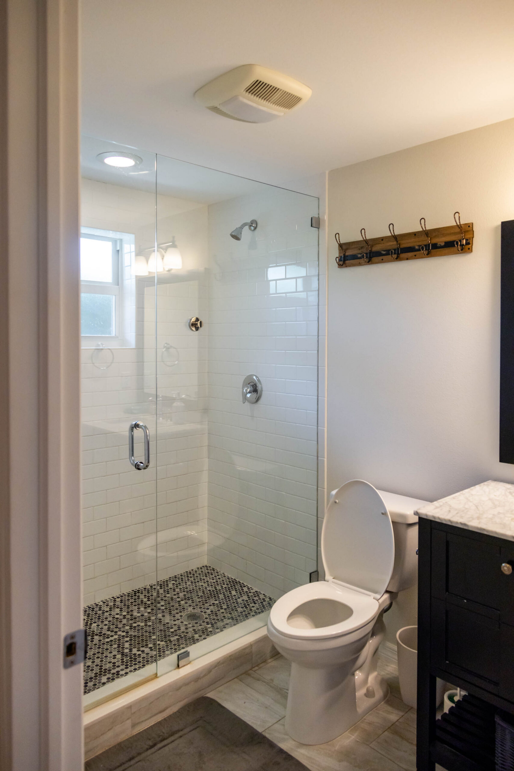 Small modern bathroom with glass walk-in shower