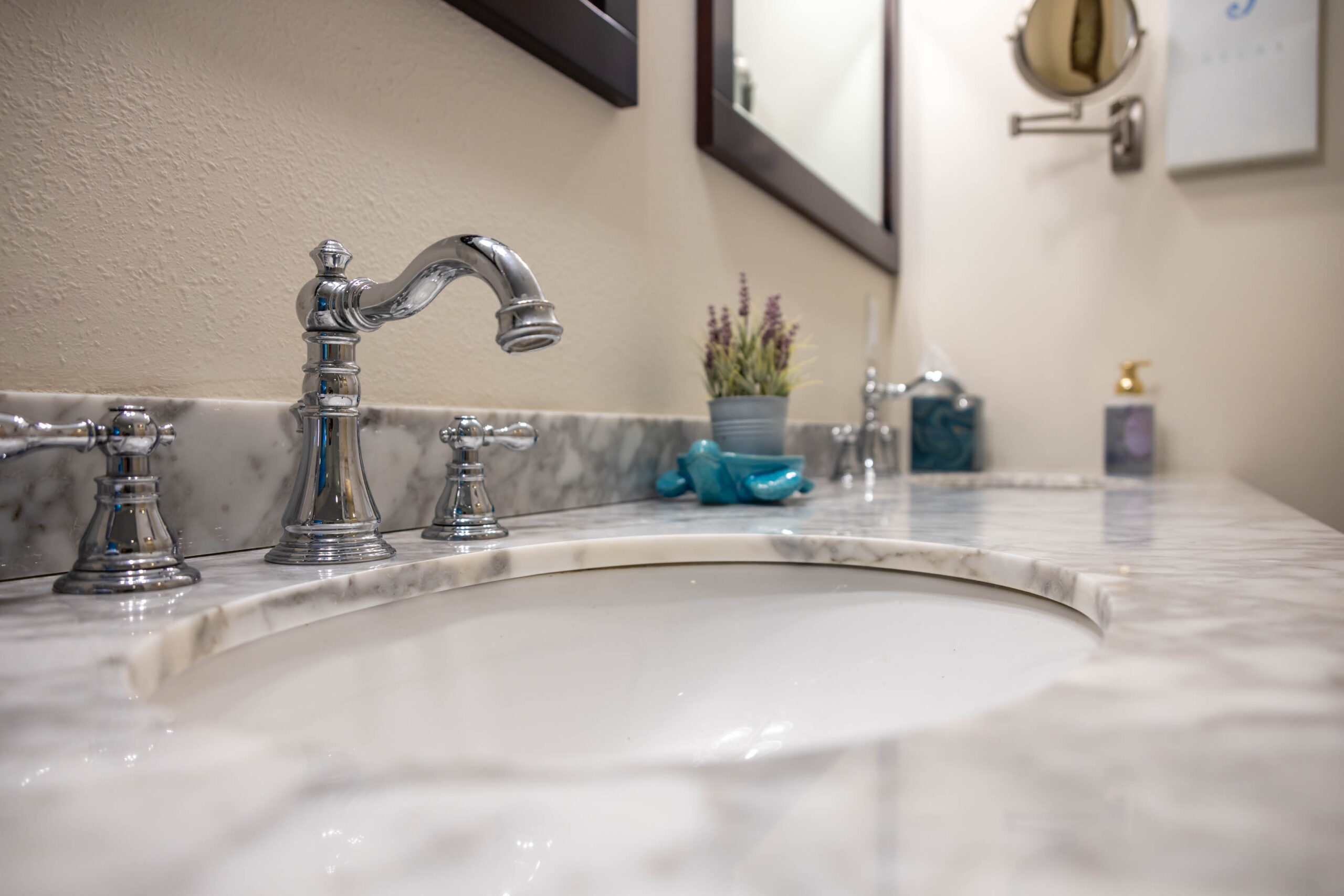 Marble bathroom sink with chrome faucet
