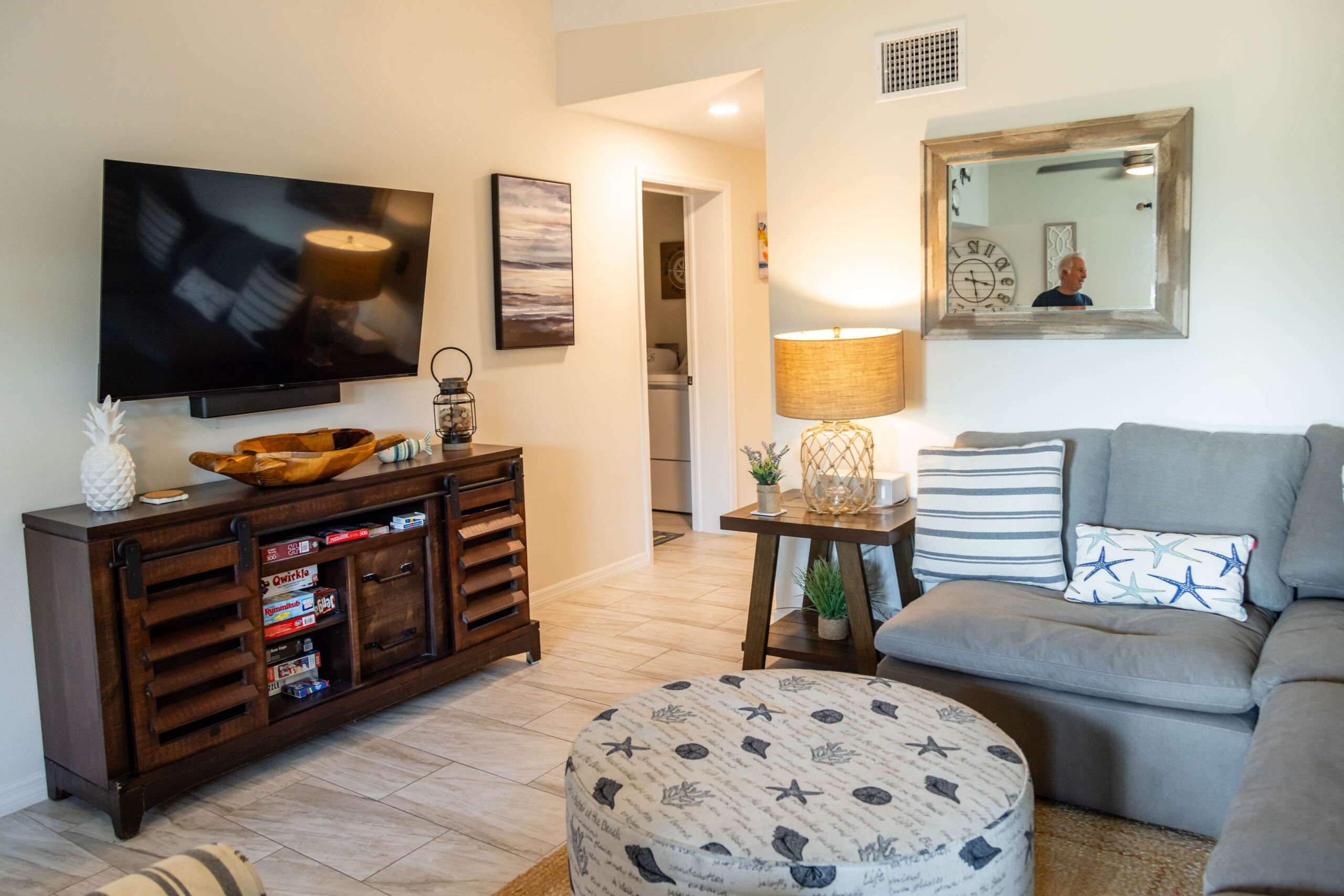 Cozy coastal living room with TV