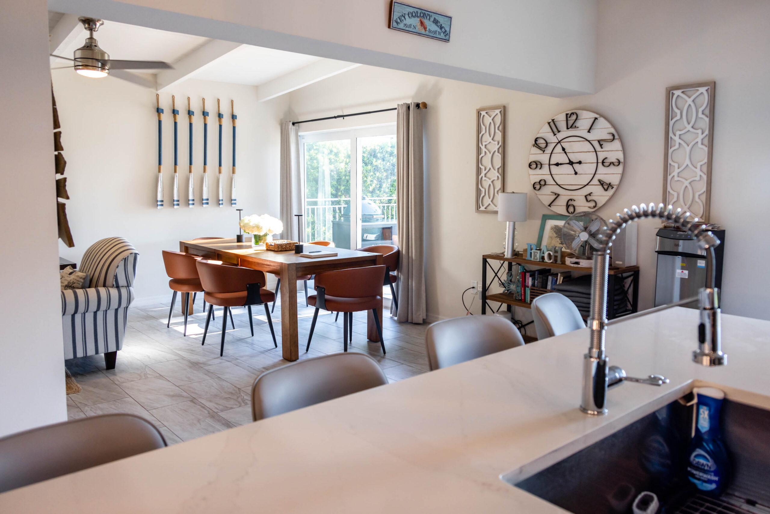 Coastal-style dining room and kitchen island