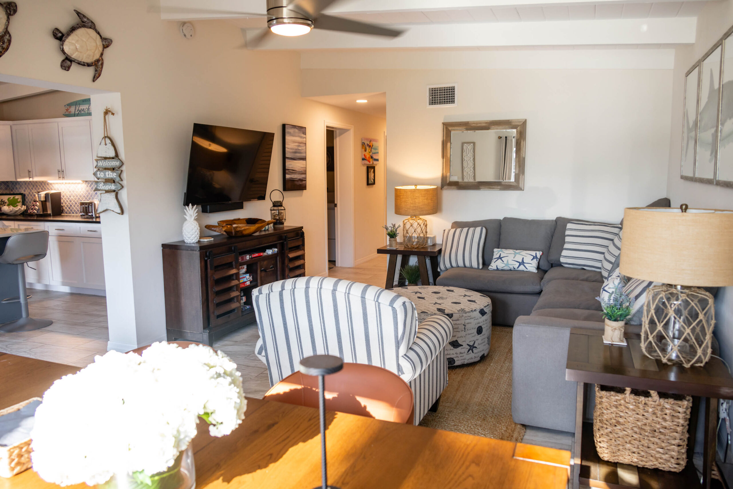 Open concept living room with gray sectional